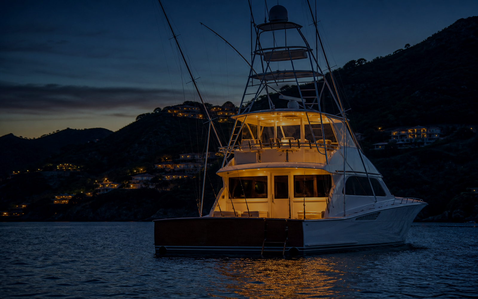 The yacht on dark water.